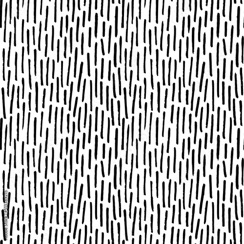 Thin vertical dashes vector seamless pattern. Black linear ornament. Memphis style background with small pen stripes. Retro black and white texture. Hand drawn regular doodle simple lines. 