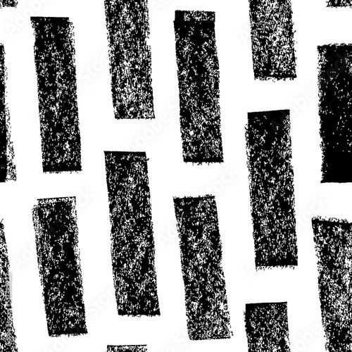 Short diagonal lines hand drawn seamless pattern. Hand drawn charcoal lines with rough texture. Simple geometric texture. Freehand textured drawing. Bold strokes and dashes. Black and white background