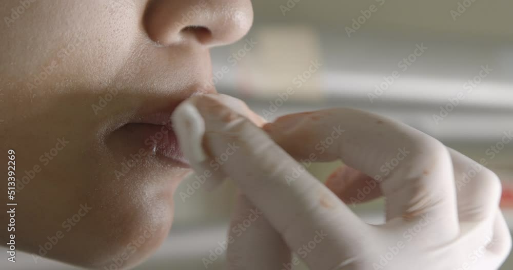 Lip cleaning during procedure. Realization of lip pigmentation ...