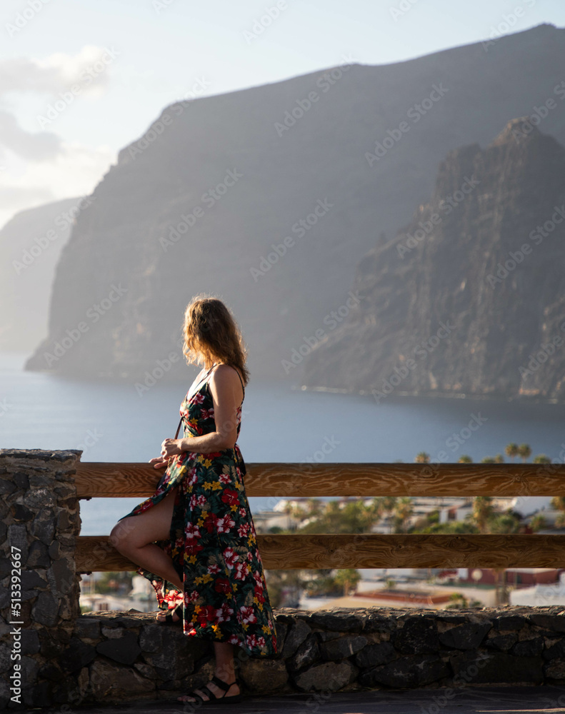 beautiful woman looking at Los Gigantes in Tenerife Canary islands