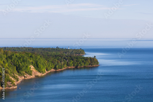South shoreline of the Lake Superior at the Pictured Lakes National Shoreline with Au Sauble light station in distance, Michigan, United States