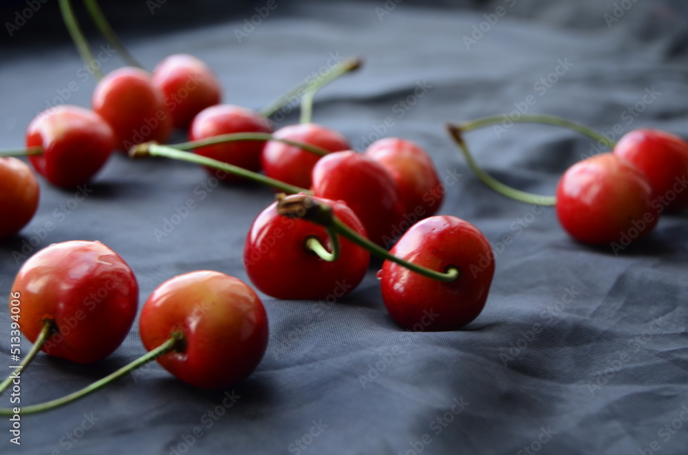 cherries on a wooden table cherries on a wooden table