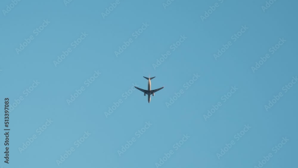 Airplane in the sky view from below. Airplane in the sky view from below.