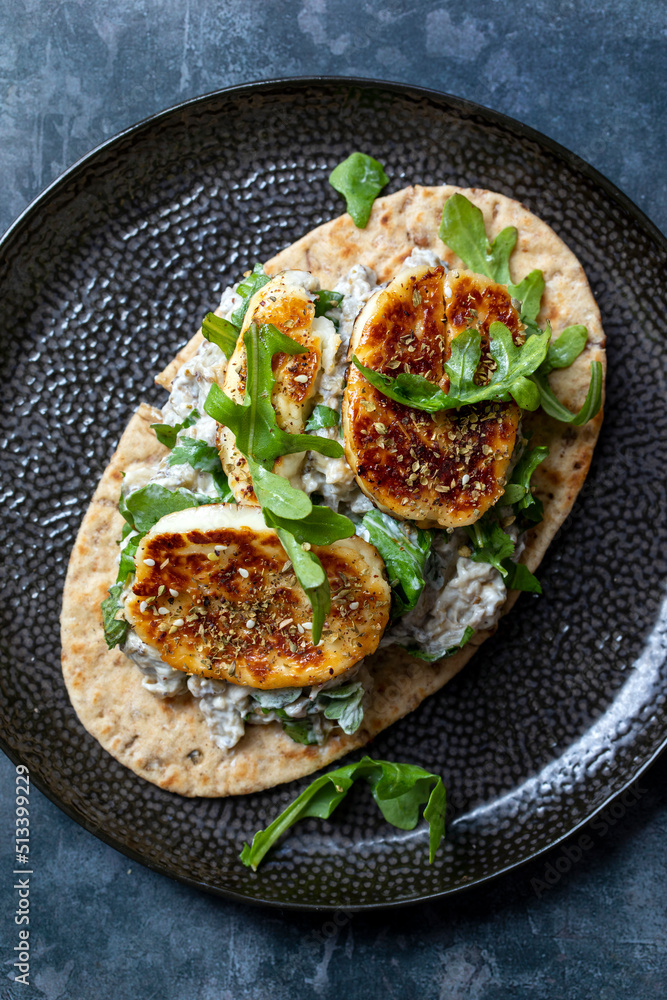 Aubergine and yogurt dip with halloumi and zaatar mix Aubergine and yogurt dip with halloumi and zaatar mix