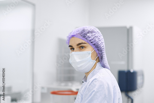 Women work in the lab. Conducts experiments on vaccines.