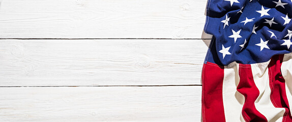 American flag on white wood. July 4th, US Independence Day creative photo