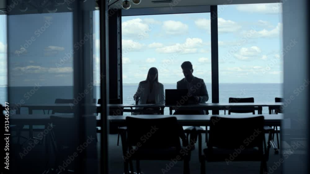 custom made wallpaper toronto digitalBusiness team silhouettes talking at sea clouds view. Two managers work laptop