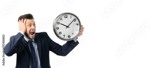 Stressed businessman holdin...
