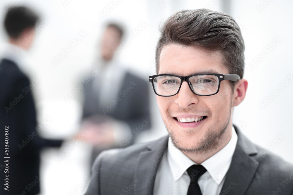 close up. the face of a young businessman in the office. close up. the face of a young businessman in the office.