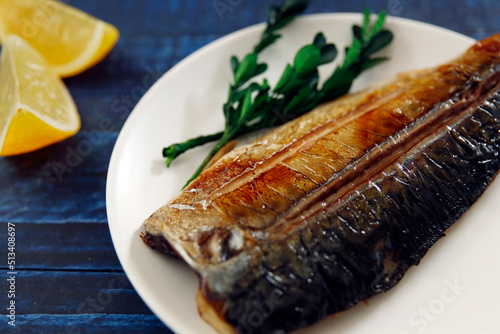 Grilled fish dish mackerel on the table