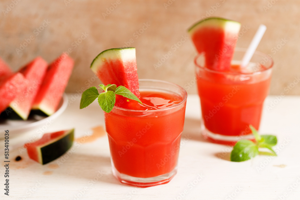 Fresh watermelon juice with ice in a glass. Fresh watermelon juice with ice in a glass.