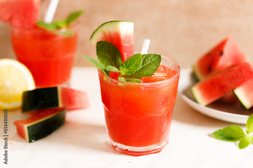 Fresh watermelon juice with ice in a glass. Fresh watermelon juice with ice in a glass.