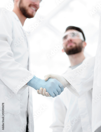 Cropped shot of medical workers shaking hands