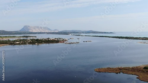 view of the lake in San Theodoro, Italy photo