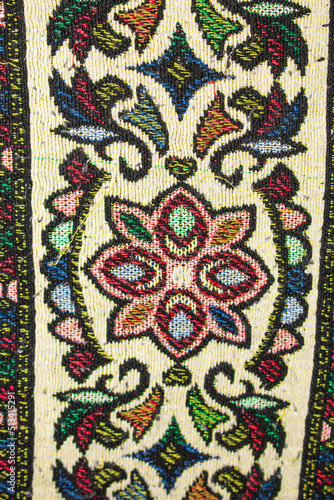 Fabric background with embroidered patterns