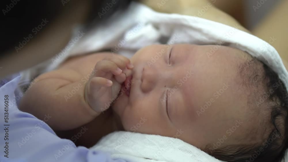 Mother dry the body of newborn baby boy after bath with towel Mother dry the body of newborn baby boy after bath with towel