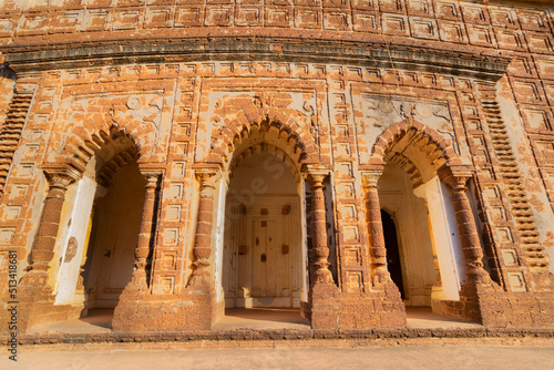 Famous terracotta (fired clay of a brownish-red colour, used as ornamental building material) artworks at Lalji Temple, Bishnupur, West Bengal, India. It is popular UNESCO heritage site of India. photo