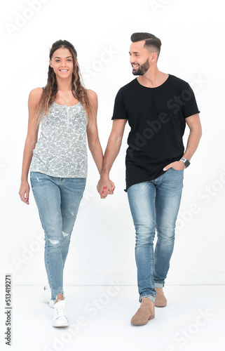 in full growth.young couple walking together