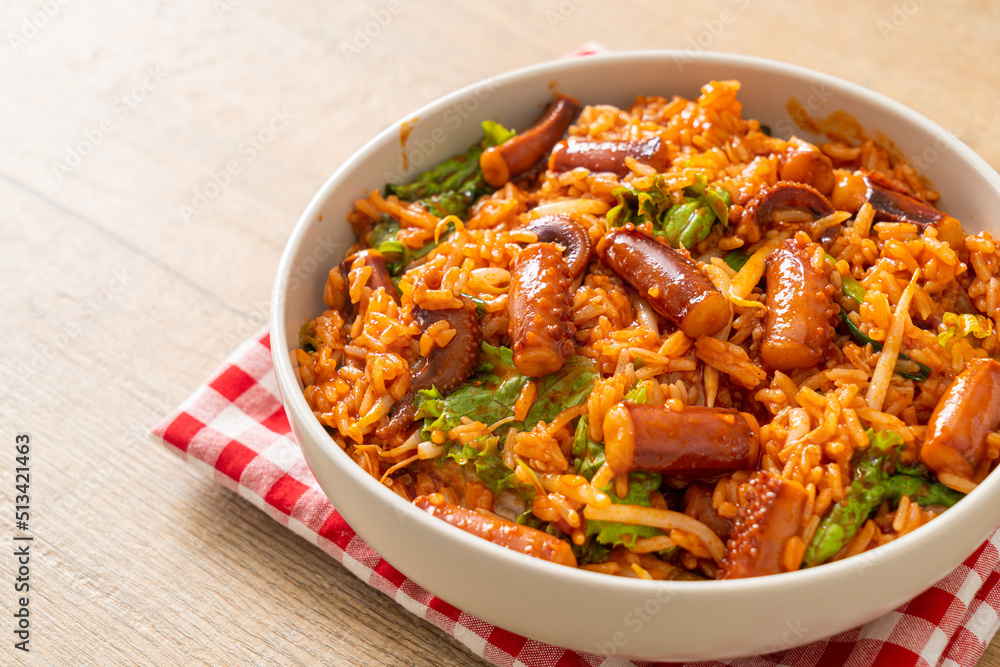 Stir-fried squid or octopus with Korean spicy sauce rice bowl Stir-fried squid or octopus with Korean spicy sauce rice bowl