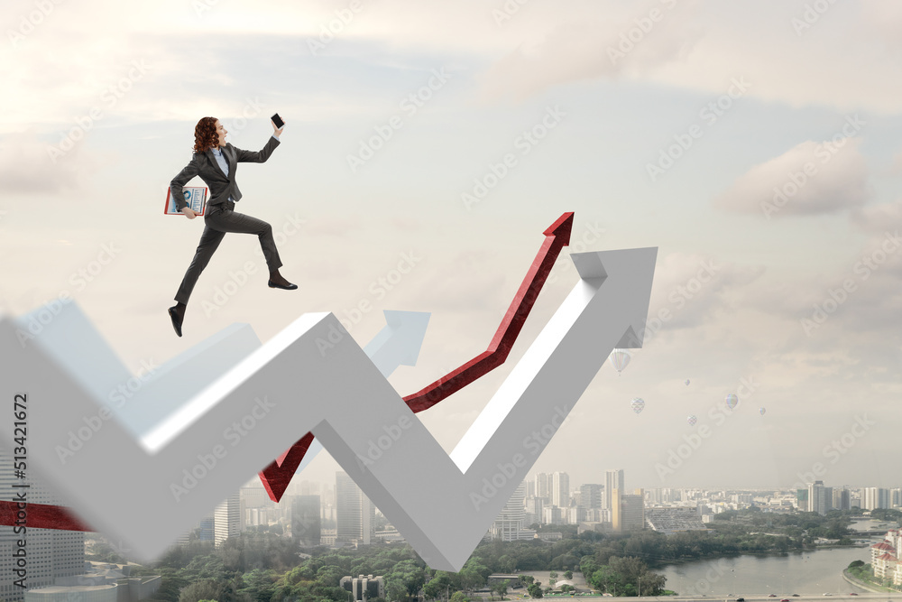 Business person climbing on red graph arrow Business person climbing on red graph arrow