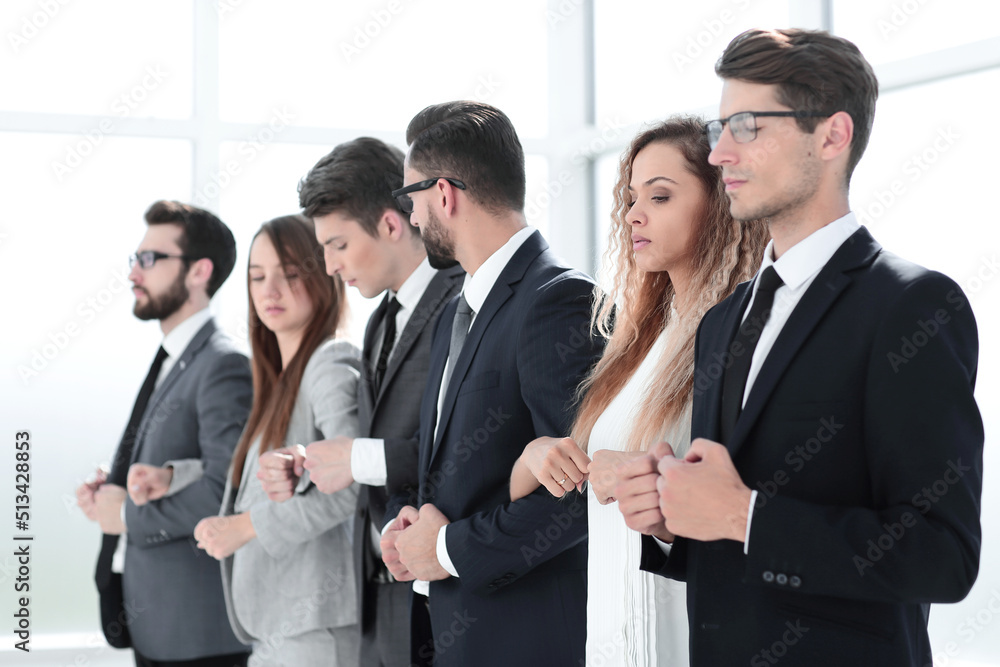 close up. business team holding each other's hands close up. business team holding each other's hands