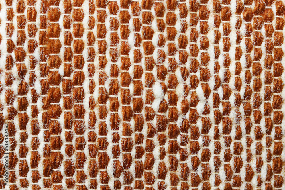 White and brown wool yarn cloth background. Surface of fabric texture in two tone colors. White and brown wool yarn cloth background. Surface of fabric texture in two tone colors.