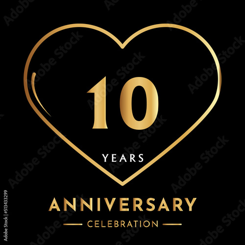 10 years anniversary logotype with gold heart isolated on black background. Creative design for happy birthday, wedding, ceremony, event party, marriage, invitation event, and greeting card.