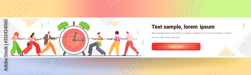 businesspeople trying to stop arrow on alarm clock effective business time management deadline competition concept