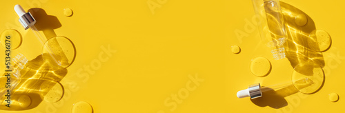 pipette drop of whey test on yellow sun glare background banner with place for advertising text 