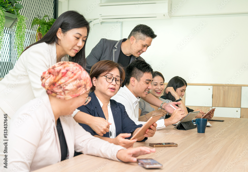 On the job training or mentoring in progress with business manager guiding executives. On the job training or mentoring in progress with business manager guiding executives.