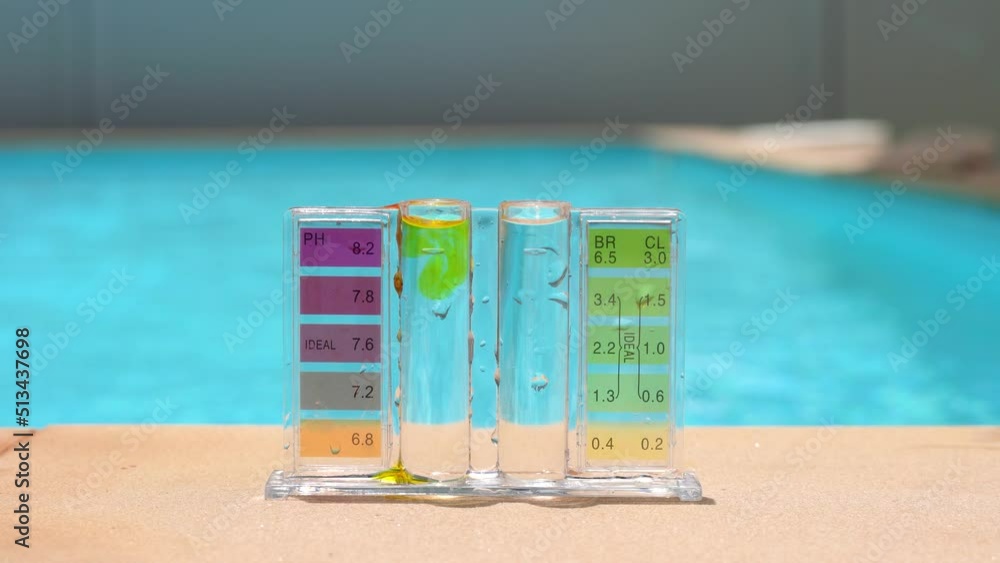 Dropping chemical to check water quality of swimming pool by compare PH