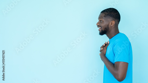 Impressed man. Wow banner. Content advertising. Side view of amazed touched surprised emotion guy isolated on blue copy space background header.