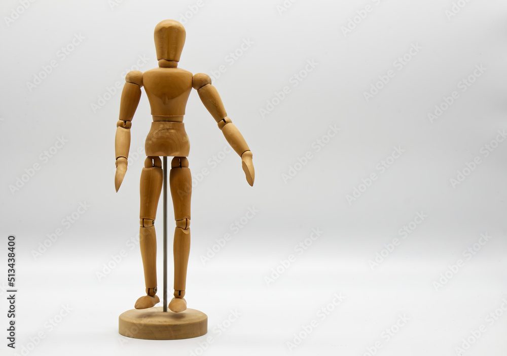 Wooden figure isolated on white background. Wood Figure Mannequin. Space for text. Wooden figure isolated on white background. Wood Figure Mannequin. Space for text.