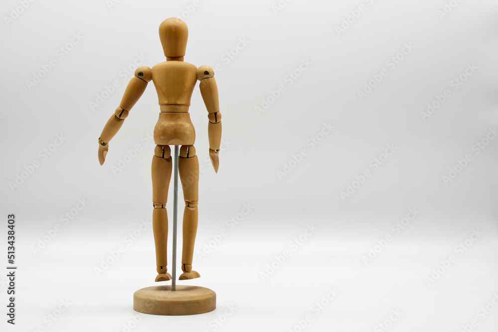 Wooden figure isolated on white background. Wood Figure Mannequin. Space for text. Wooden figure isolated on white background. Wood Figure Mannequin. Space for text.