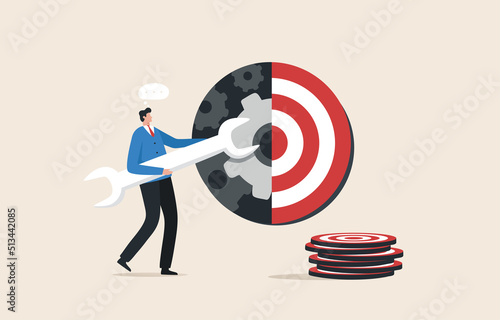 Goal setting. Action plan to set goals. Assess abilities and passion.  plan clearly and act immediately. Businessman holding a wrench to adjust the dartboard target.