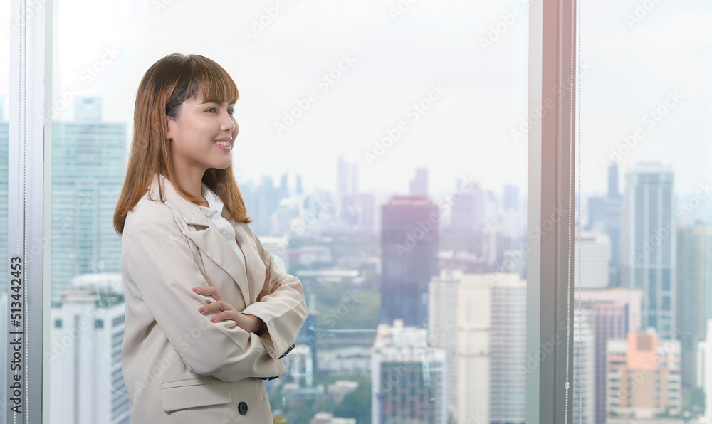 Portrait of young beautiful Business Woman smiling in modern office Portrait of young beautiful Business Woman smiling in modern office