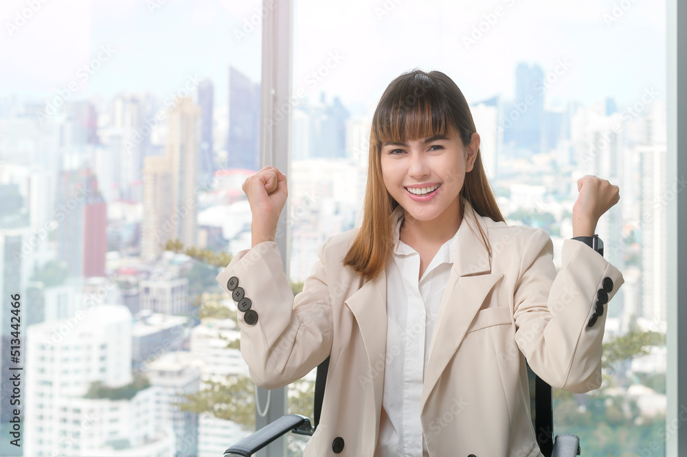 Portrait of young beautiful Business Woman smiling in modern office Portrait of young beautiful Business Woman smiling in modern office