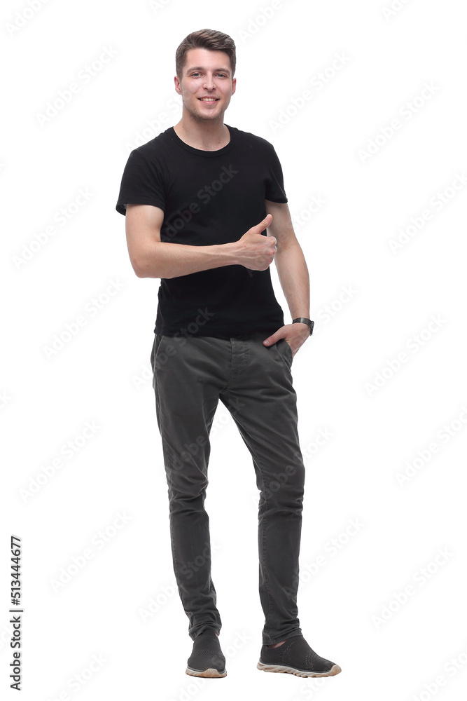 in full growth. handsome guy showing thumb up in full growth. handsome guy showing thumb up