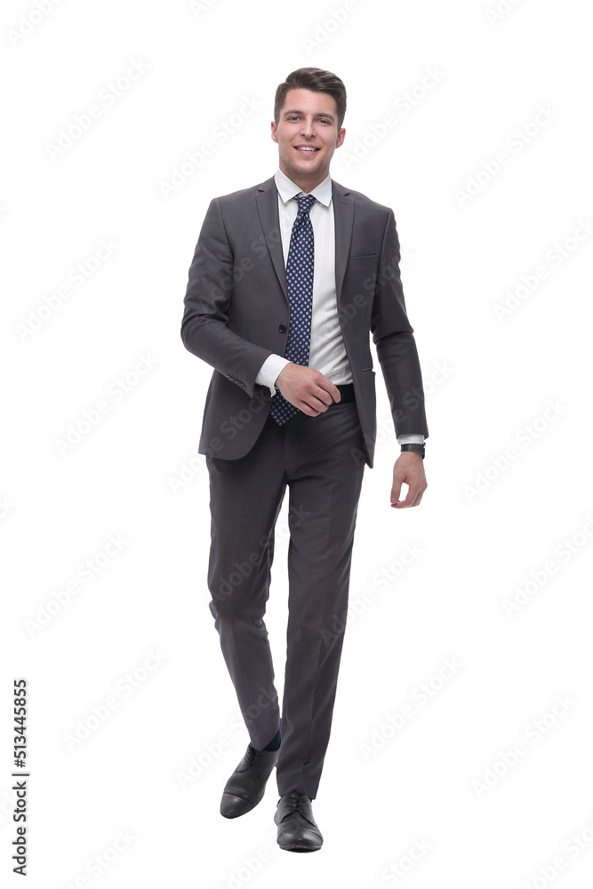 Executive young businessman confidently goes forward. isolated on white Executive young businessman confidently goes forward. isolated on white