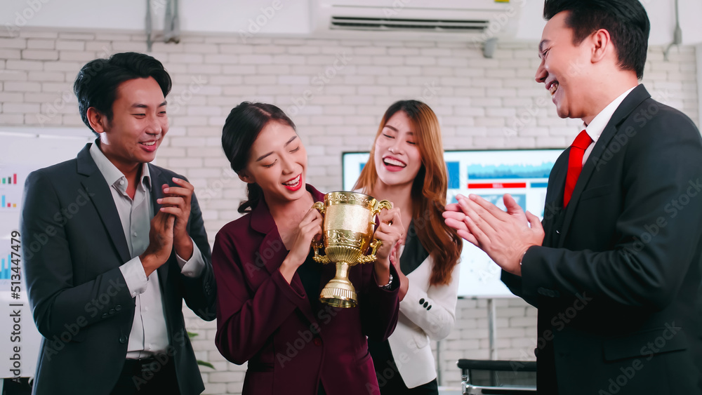An employee of the company is proud to receive an award for a successful project. An employee of the company is proud to receive an award for a successful project.