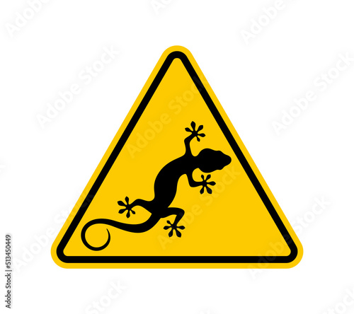 Vector yellow triangle sign - black silhouette lizard. Isolated on white background.  Isolated on white background.