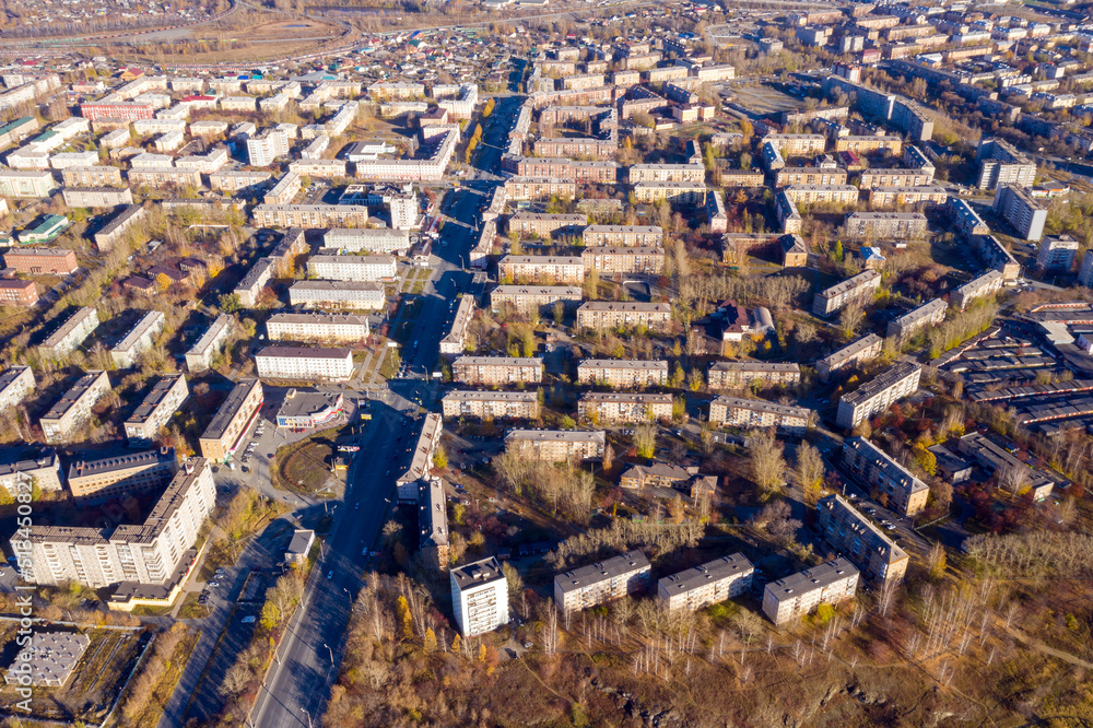 Top view of typical city in the Russian province in autumn
