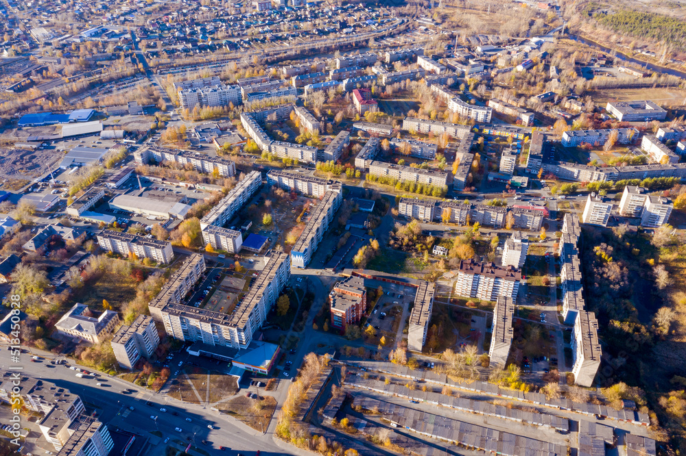 Top view of typical city in the Russian province in autumn