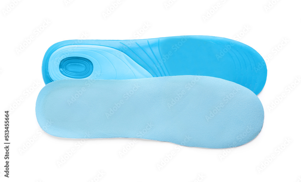 Light blue orthopedic insoles isolated on white, top view Light blue orthopedic insoles isolated on white, top view