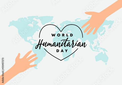 World humanitarian day background with handwritten text and hand on world map isolated on grey white background.