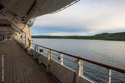View of the Midnight Sun in the Barents Sea, from the deck of a ship