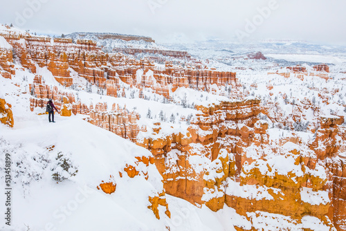 Hiker girl in winter in Bryce Canyon National Park, United States Of America