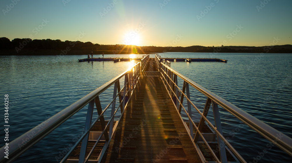 Fototapeta premium bridge on ocean at sunset