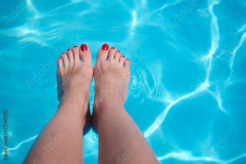 Feet in the pool. Sea tourism. Hotel rest. Advertising for tourism