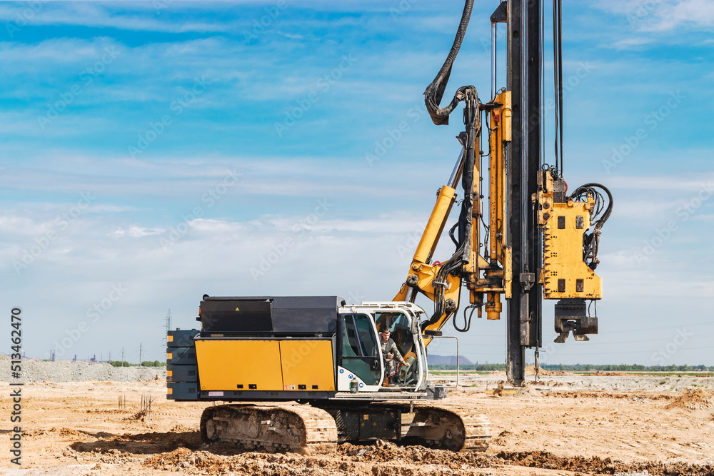 Hydraulic drilling machine at the construction site. Pile field. Modern ...